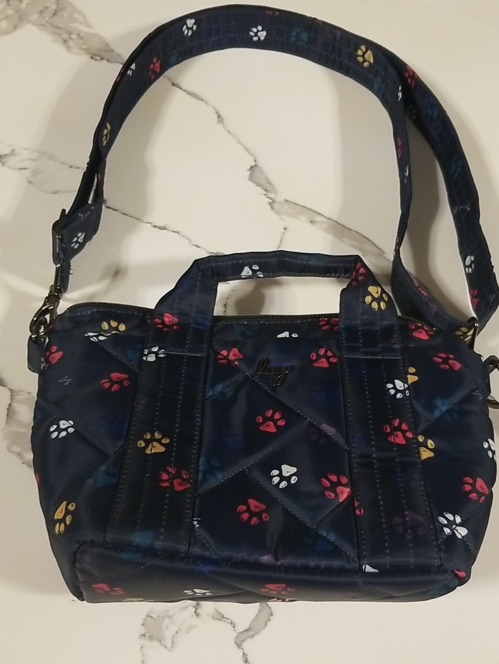 Lug Navy Paw-Print Crossbody Bag